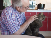 JS and Hermes the cat at kitchen table by Lisa 17